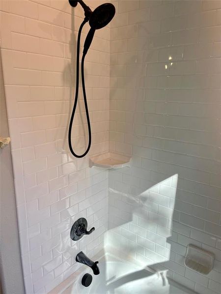 Interior details with a tile shower