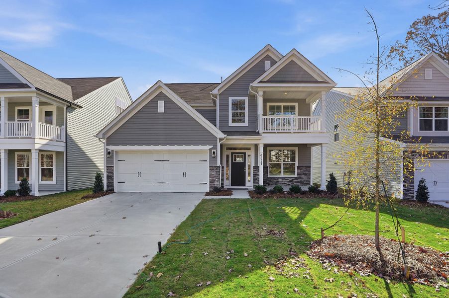 Front exterior of a new home in Grier Meadows, Charlotte, NC, highlighting curb appeal (Image 1).