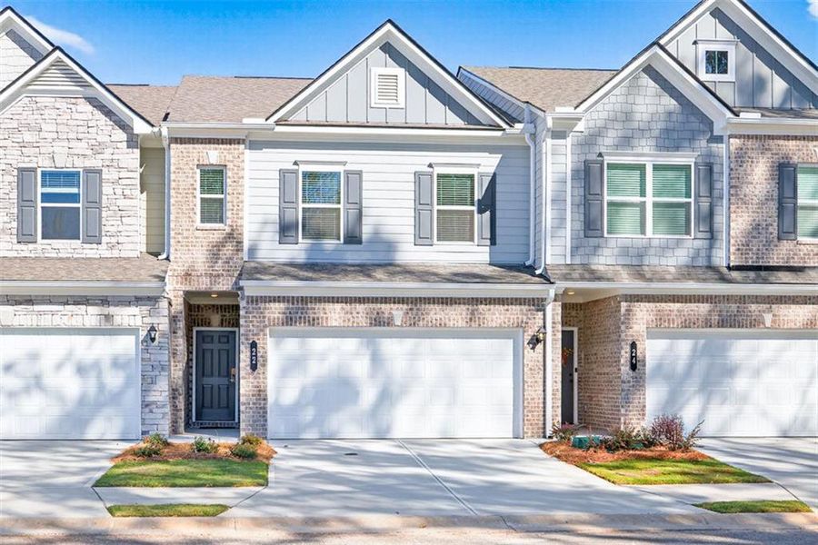 Front exterior of a new home in Franklin Manor, Lawrenceville, GA, highlighting curb appeal (Image 1). Front exterior of a new home in Franklin Manor, Lawrenceville, GA, highlighting curb appeal (Image 1).