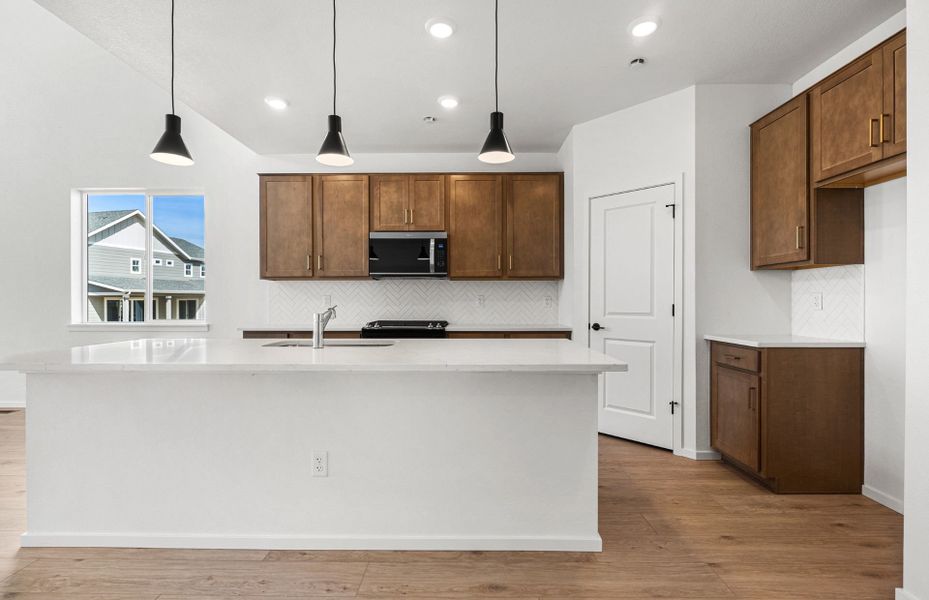 Furnished interior view inside a new home in Harvest Crossing, Aurora (Image 12).