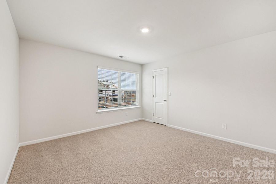 Spacious, unfurnished interior of a new home in Wallace Springs, Statesville (Image 15).