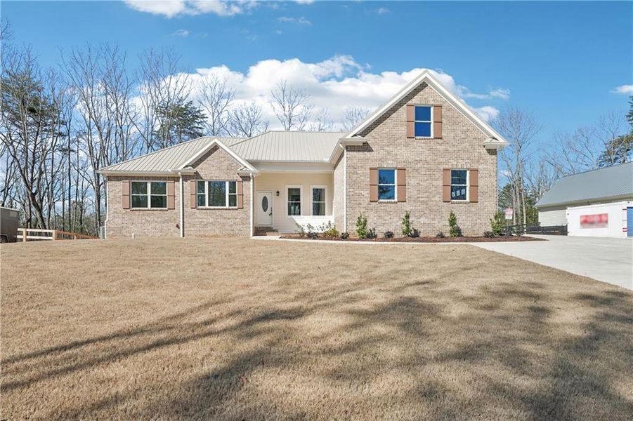 Front exterior of a new home in , Canton, GA, highlighting curb appeal (Image 34). Front exterior of a new home in , Canton, GA, highlighting curb appeal (Image 34).