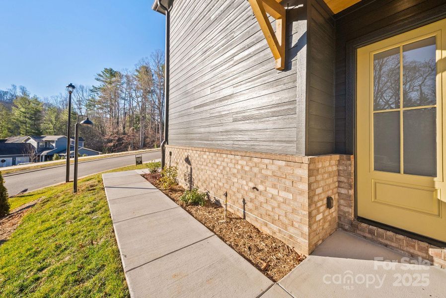 Exterior details and patio area of a home in , Asheville (Image 3).