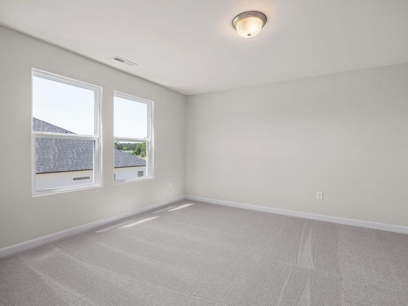 Spacious, unfurnished interior of a new home in Retreat at North Main, Lillington (Image 13).
