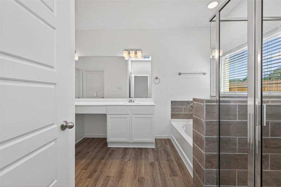 Furnished interior view inside a new home in Enclave at Willis, Willis (Image 12).