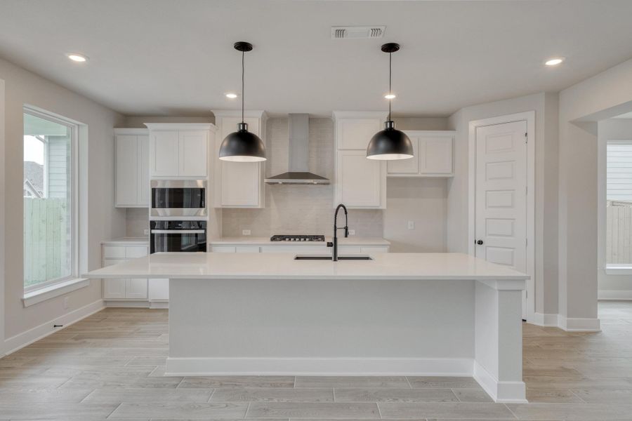Furnished interior view inside a new home in The Colony, Bastrop (Image 8).