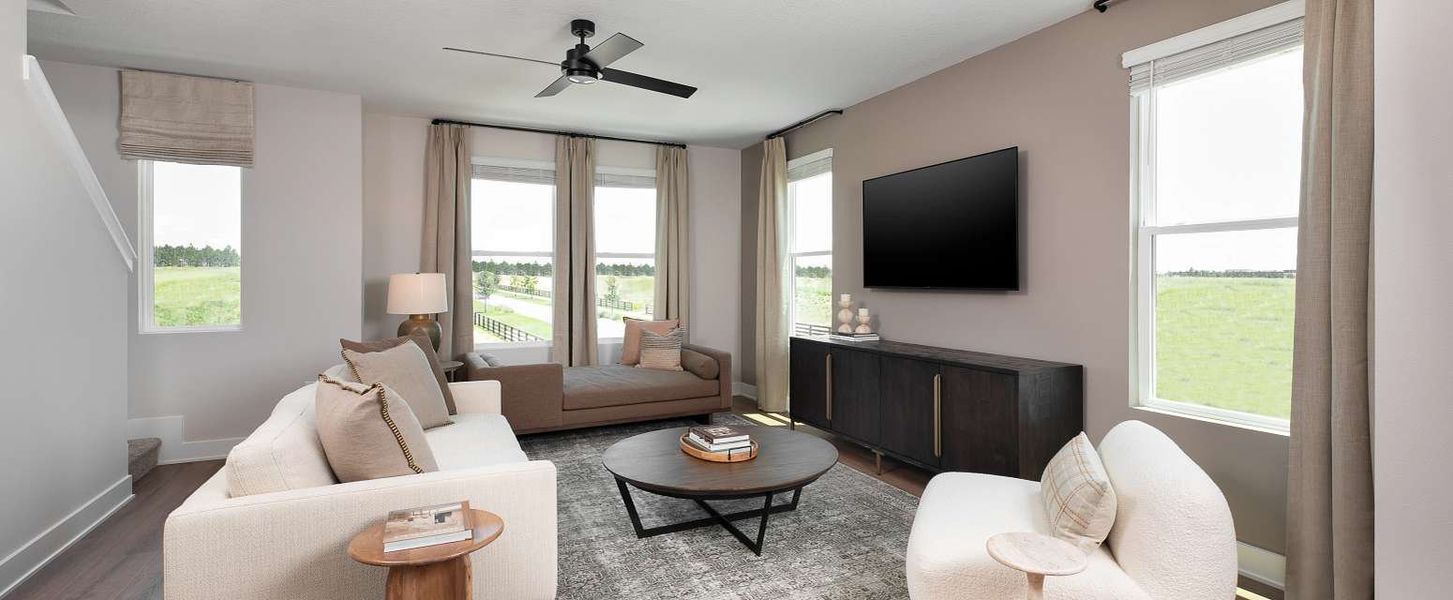 Representative furnished interior of a home built from the Haines II End Unit by Ashton Woods in Parkview at Hamlin, Winter Garden (Image 7).