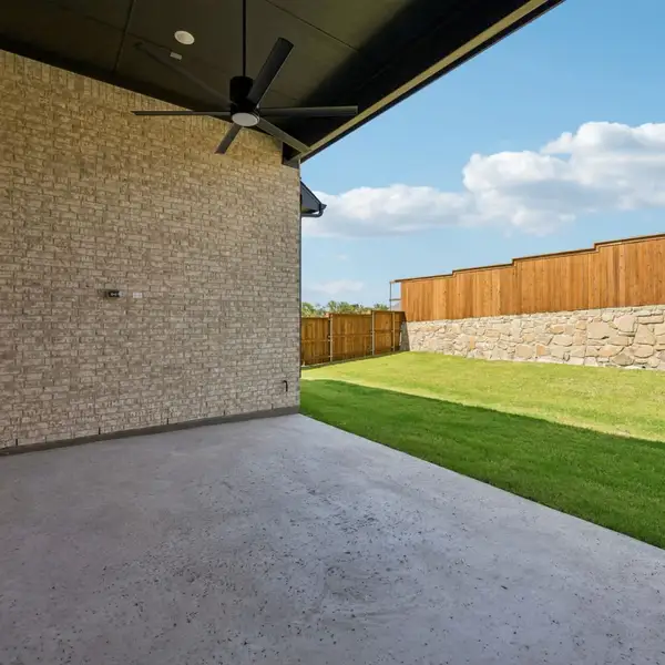 Exterior details and patio area of a home in The Parks at Wilson Creek, Celina (Image 29). Exterior details and patio area of a home in The Parks at Wilson Creek, Celina (Image 29).