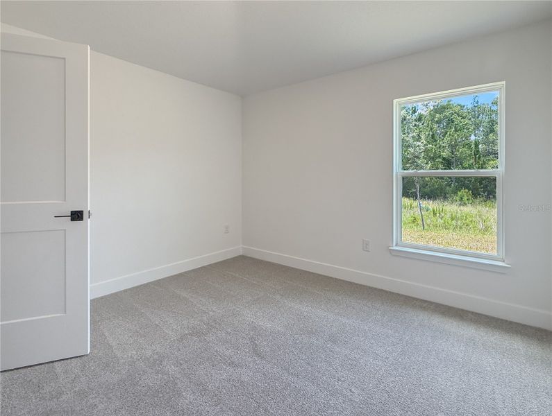 Spacious, unfurnished interior of a new home in Harmony Central, St. Cloud (Image 14).