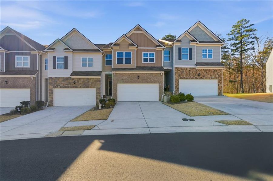 Front exterior of a new home in , Dahlonega, GA, highlighting curb appeal (Image 1). Front exterior of a new home in , Dahlonega, GA, highlighting curb appeal (Image 1).
