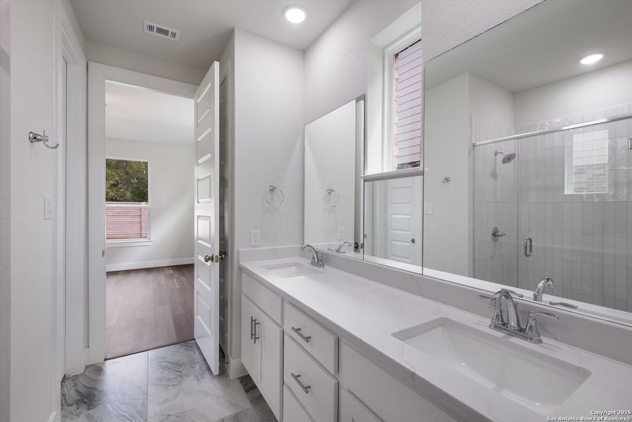 Furnished interior view inside a new home in Crown Ridge Manor, San Antonio (Image 9).