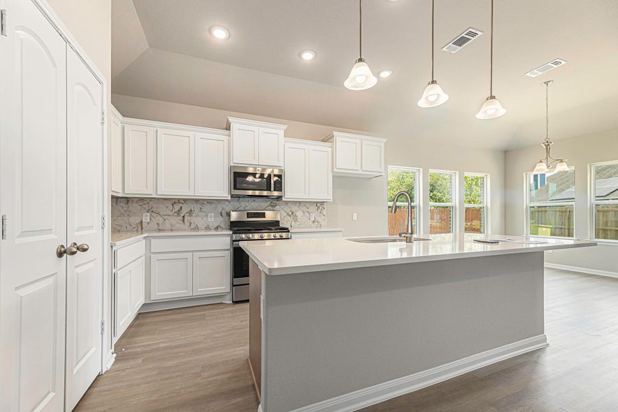 Furnished interior view inside a new home in , Bay City (Image 6). Furnished interior view inside a new home in , Bay City (Image 6).