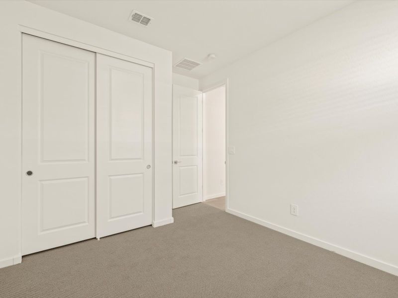 Spacious, unfurnished interior of a new home in Mesquite Mountain Ranch at Frontera, Surprise (Image 17).