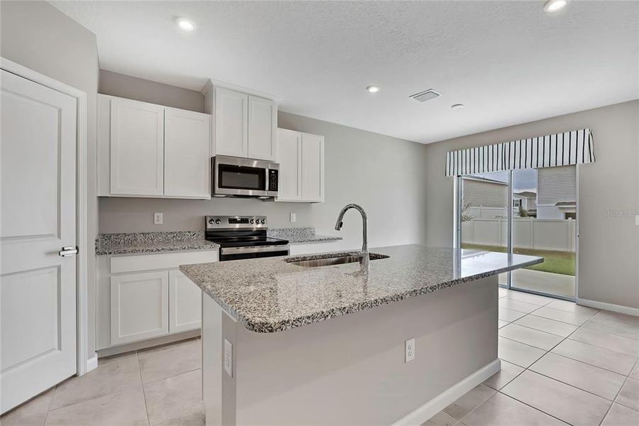 Furnished interior view inside a new home in , Sumterville (Image 7).