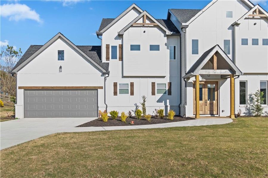 Front exterior of a new home in , Clermont, GA, highlighting curb appeal (Image 21). Front exterior of a new home in , Clermont, GA, highlighting curb appeal (Image 21).