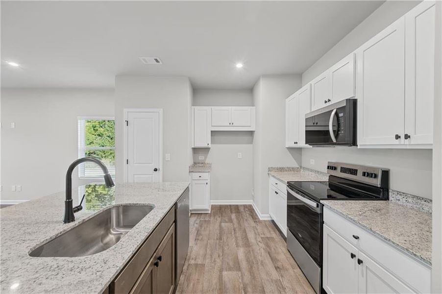 Furnished interior view inside a new home in Village Green, Adairsville (Image 4).
