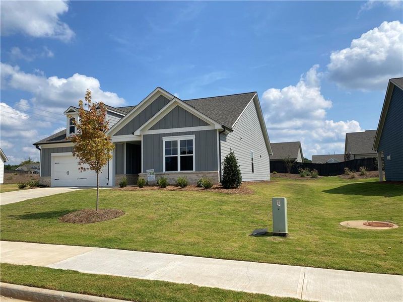 Front exterior of a new home in , Jefferson, GA, highlighting curb appeal (Image 26).