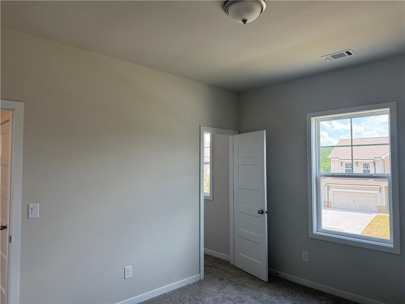 Spacious, unfurnished interior of a new home in Rosewood Lake Estates, Hoschton (Image 38).