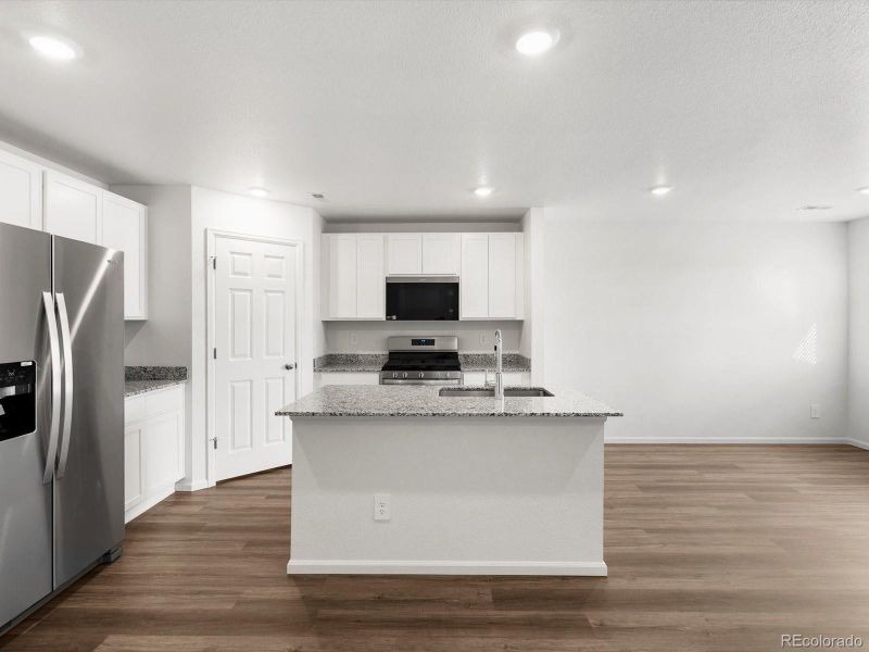 Furnished interior view inside a new home in Skyview at High Point, Aurora (Image 13).