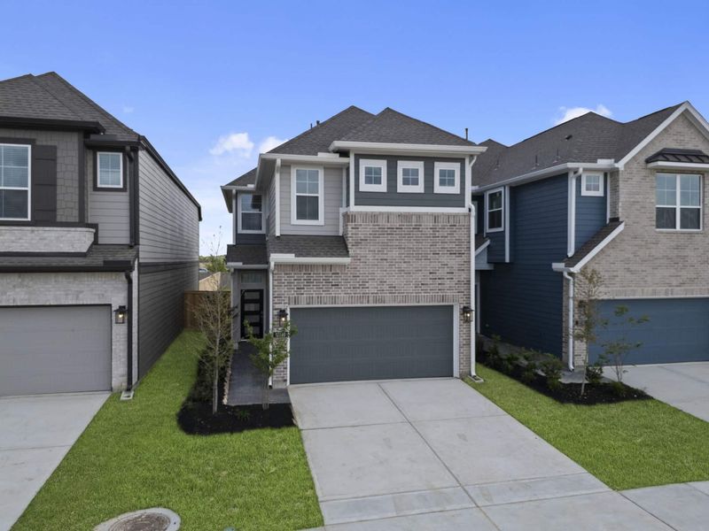 Front exterior of a new home in Bridgeland, Cypress, TX, highlighting curb appeal (Image 21).
