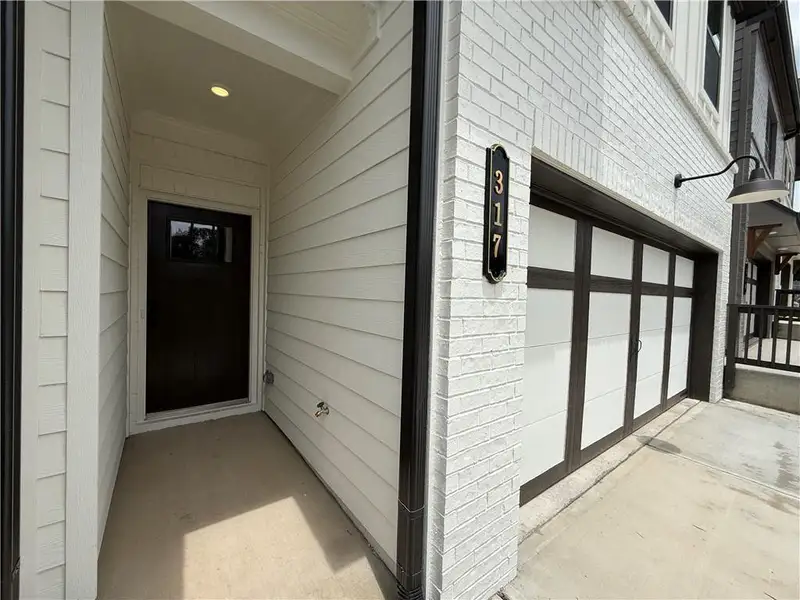 Exterior details and patio area of a home in The Towns at Auburn Station East, Auburn (Image 3).