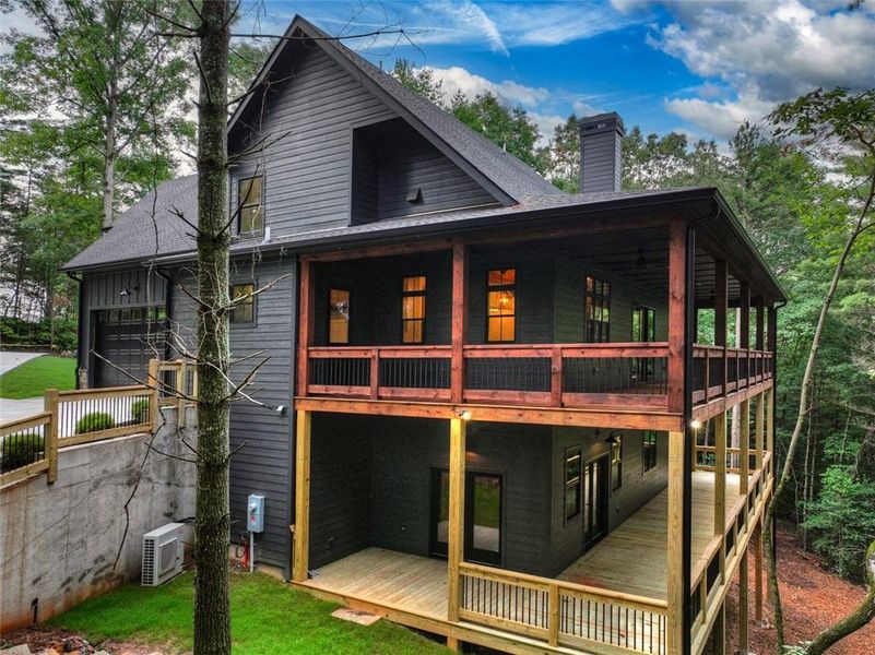 Exterior details and patio area of a home in , Ellijay (Image 32).