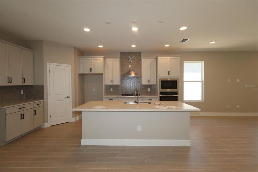 Furnished interior view inside a new home in Lake Star at Ovation, Winter Garden (Image 6).