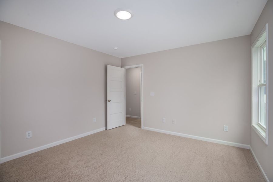 Spacious, unfurnished interior of a new home in Stewart Estates, Meansville (Image 29).