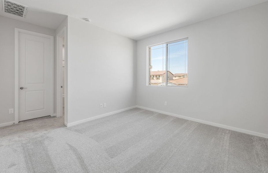 Spacious, unfurnished interior of a new home in Jorde Farms, Queen Creek (Image 20).