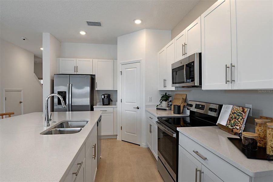 Furnished interior view inside a new home in Vinterra Townhomes, Nokomis (Image 9).