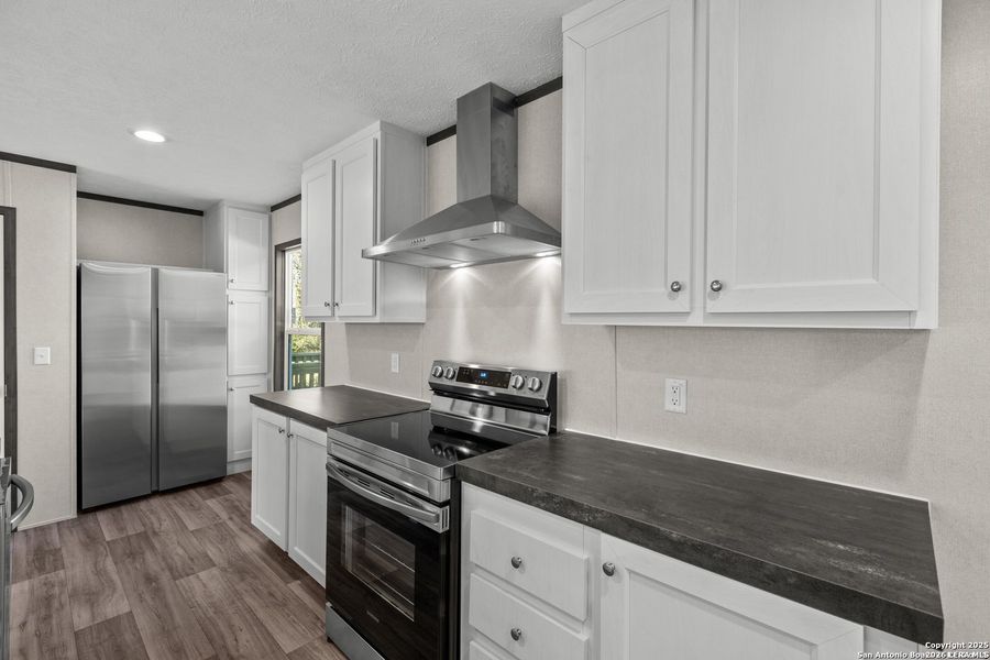 Furnished interior view inside a new home in , Jourdanton (Image 4).