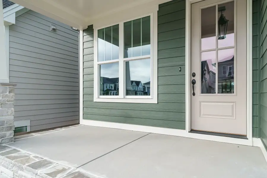 Exterior details and patio area of a home in Wendell Falls, Wendell (Image 3).