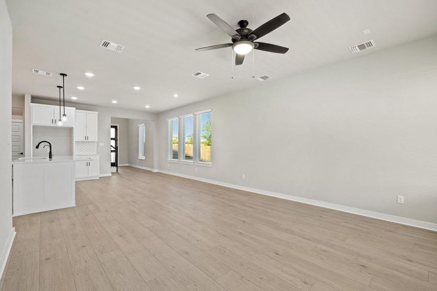 Spacious, unfurnished interior of a new home in Heritage, Dripping Springs (Image 17).