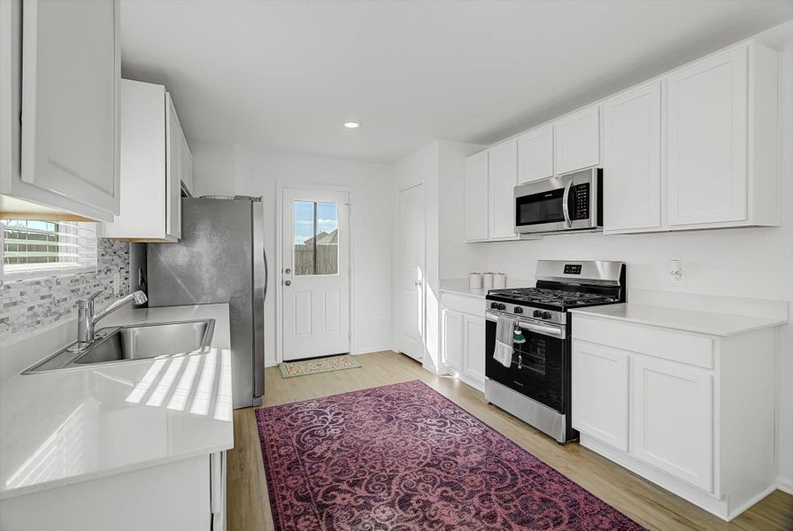 Furnished interior view inside a new home in Pinewood at Grand Texas: Colonial & Cottage Collections, New Caney (Image 10).