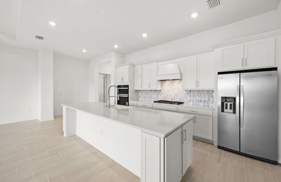Furnished interior view inside a new home in TerraWalk at Babcock Ranch, Alva (Image 4).