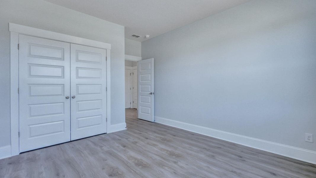 Spacious, unfurnished interior of a new home in Berkeley Bay, Ridgeville (Image 34).