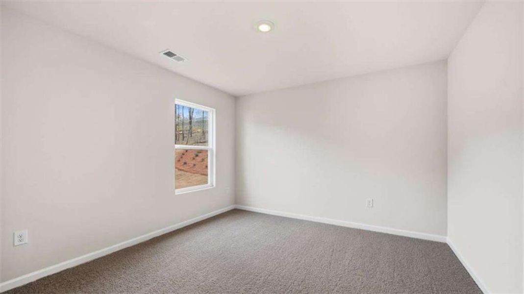 Spacious, unfurnished interior of a new home in Brooks Station, Dacula (Image 28).