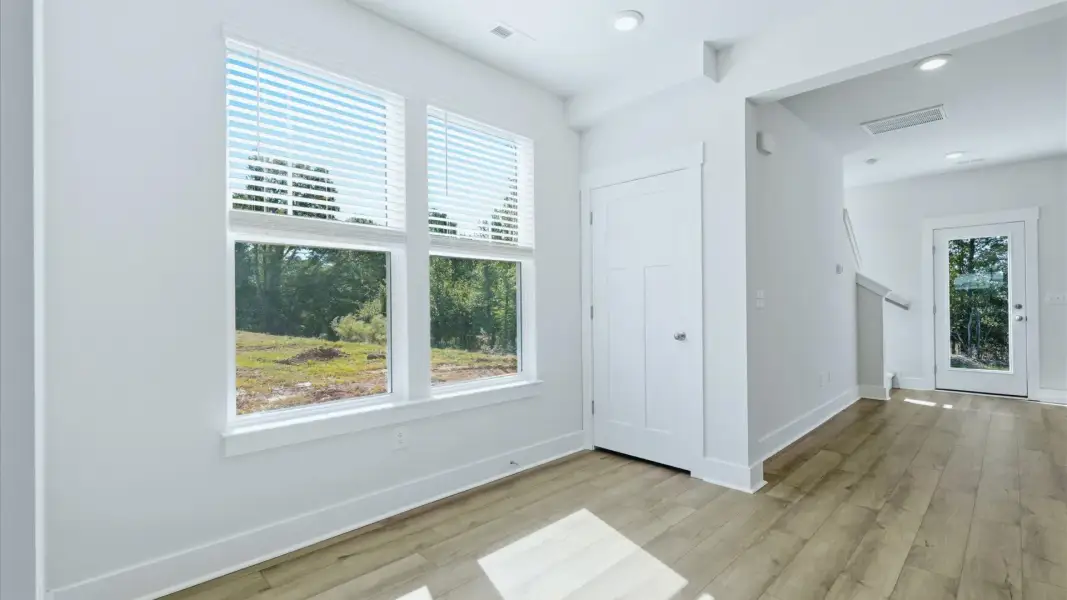 Inviting breakfast area with a seamless connection to the kitchen for everyday living by DRB Homes