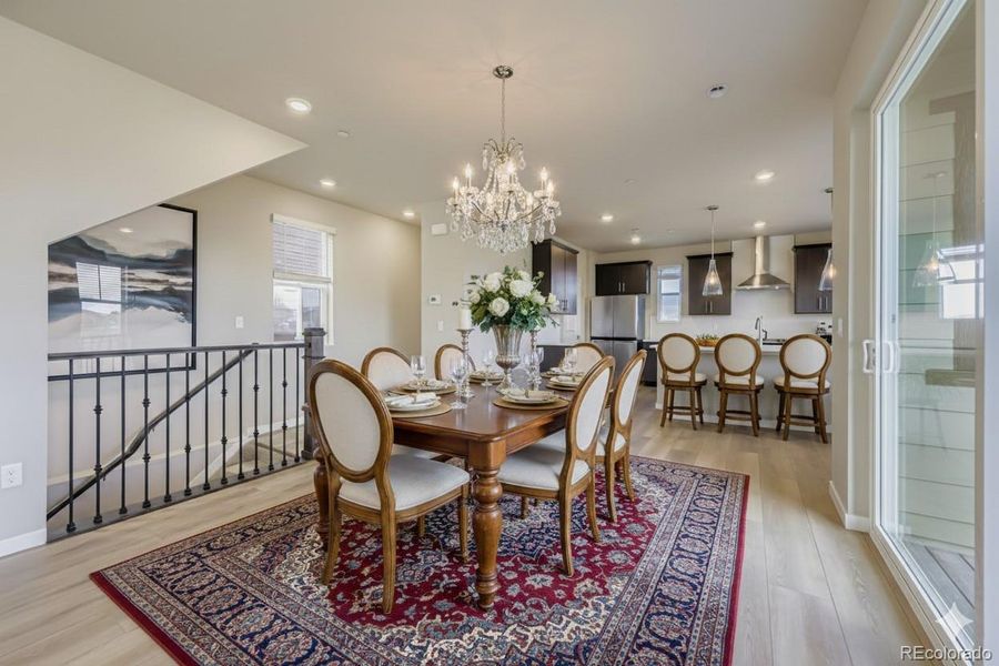 virtually staged dining / kitchen