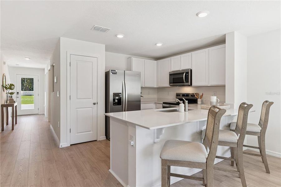 Furnished interior view inside a new home in Sandalwood, New Smyrna Beach (Image 11).