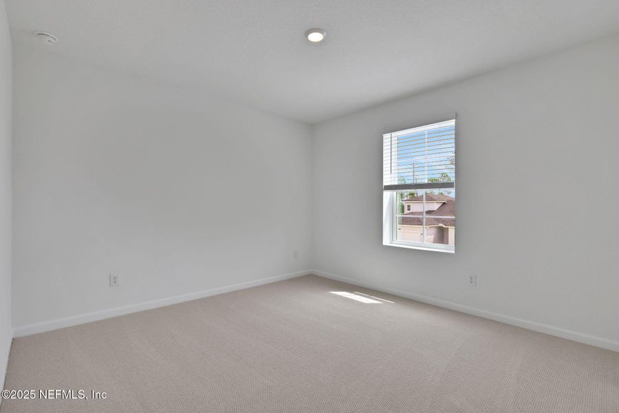 Spacious, unfurnished interior of a new home in Cordova Palms, St. Augustine (Image 22).