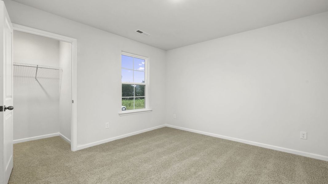 Representative unfurnished interior of a home built from the Manning by D.R. Horton in Chandler Pointe, Rural Hall (Image 24).
