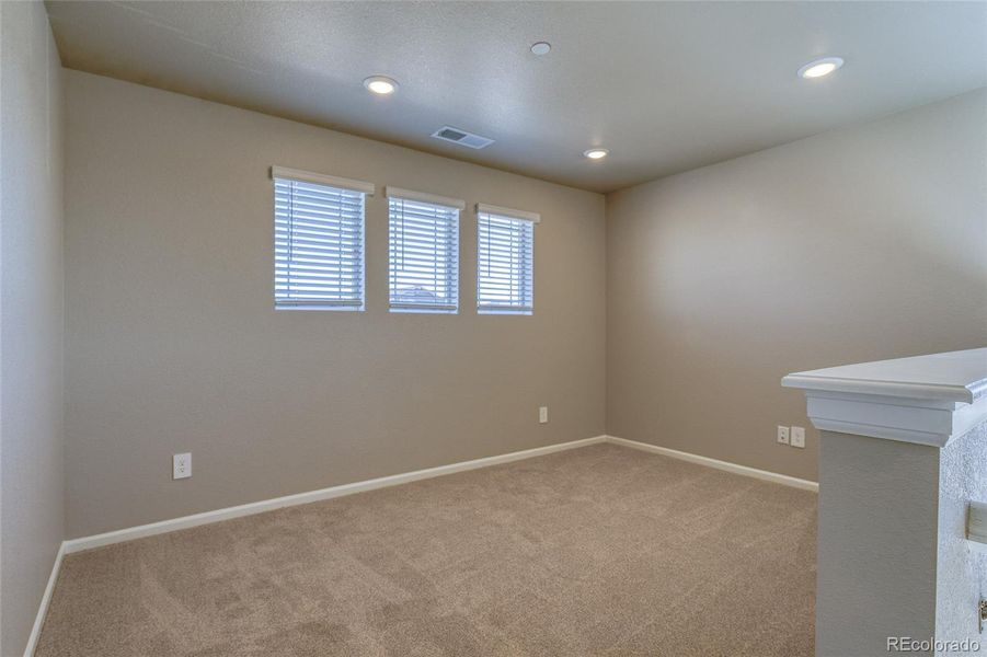 Spacious, unfurnished interior of a new home in Buffalo Highlands: The Flora Collection, Commerce City (Image 31).