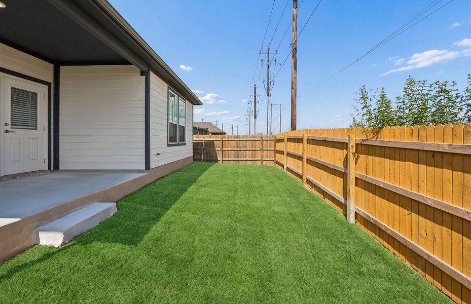 Exterior details and patio area of a home in Crosswinds, Kyle (Image 3).