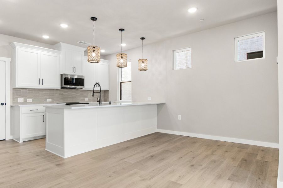 Furnished interior view inside a new home in Wildridge, Oak Point (Image 7).