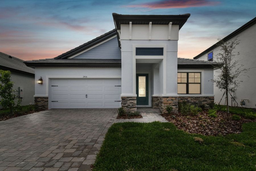 Representative exterior photo of a completed home built from the Solana II by William Ryan Homes in Pinecone Reserve, Brooksville, FL (Image 15). Representative exterior photo of a completed home built from the Solana II by William Ryan Homes in Pinecone Reserve, Brooksville, FL (Image 15).