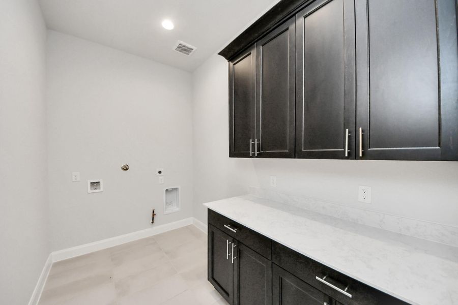 Furnished interior view inside a new home in Marvida, Cypress (Image 16).