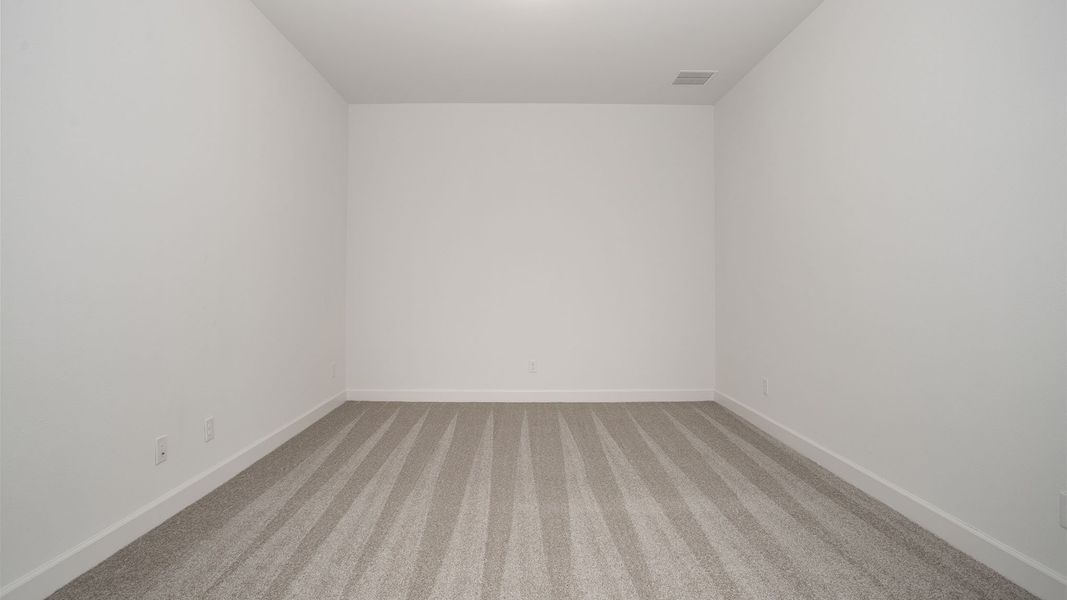 Spacious, unfurnished interior of a new home in Legacy Prairie at Katy Court, Katy (Image 18).