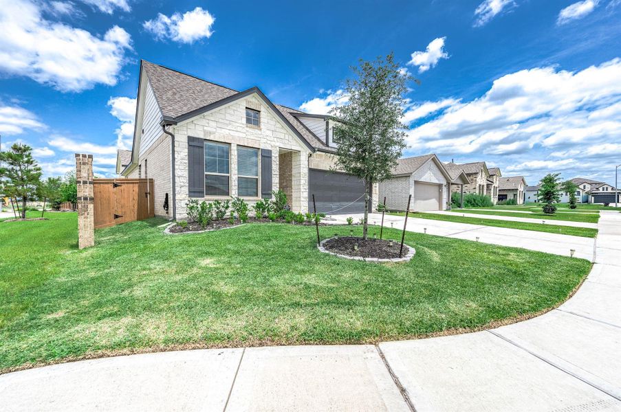 Front exterior of a new home in , Beasley, TX, highlighting curb appeal (Image 23).