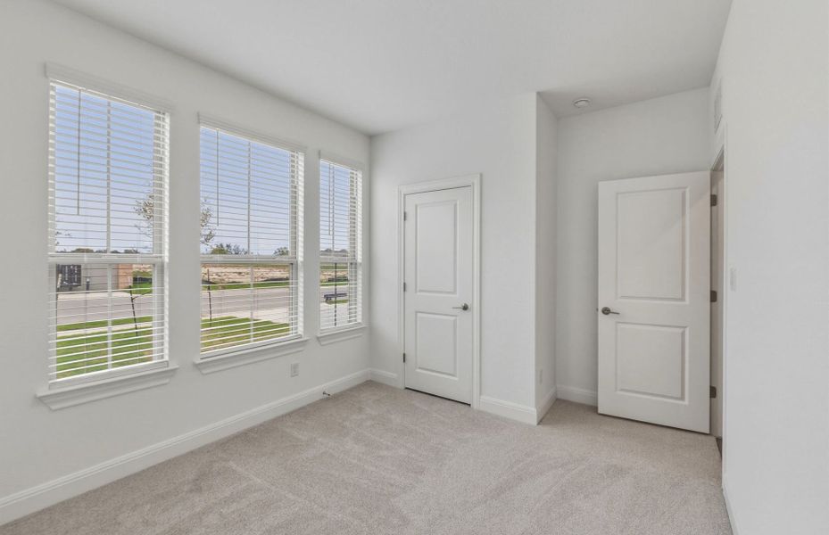Spacious, unfurnished interior of a new home in Saddleback at Santa Rita Ranch, Liberty Hill (Image 33).